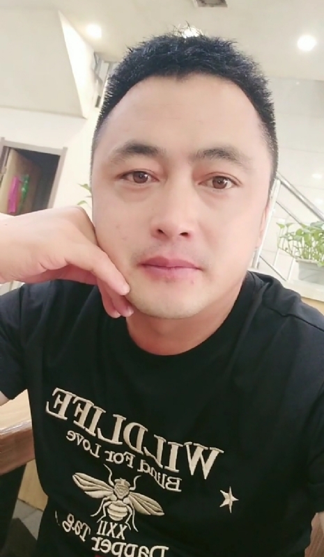廖艾德的第一张照片--将乐婚介网